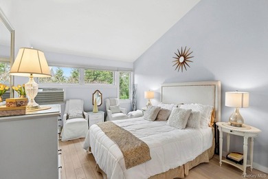 Light-filled and inviting, this upper-level residence at East - photo 10