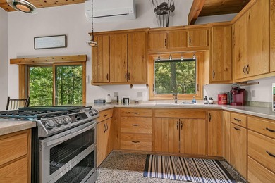 Tucked away on 1.78 private and wooded acres along the majestic - photo 12