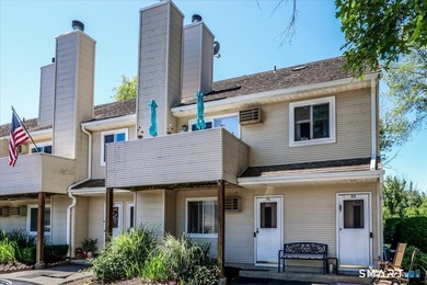 Welcome to this well-maintained Danbury condominium offering - photo 1