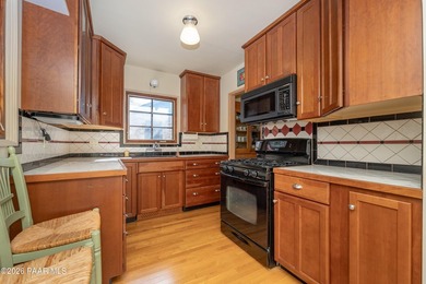 This beautiful Historic Craftsman style home is one of only 14