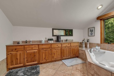 Tucked away on 1.78 private and wooded acres along the majestic - photo 33