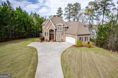 LAKEFRONT STUNNER! This home is absolutely beautiful and has - Lake Home For Sale in Milledgeville, Georgia