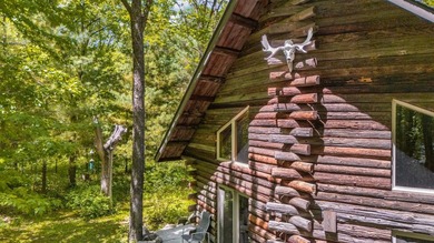 Tucked away on 1.78 private and wooded acres along the majestic - photo 42