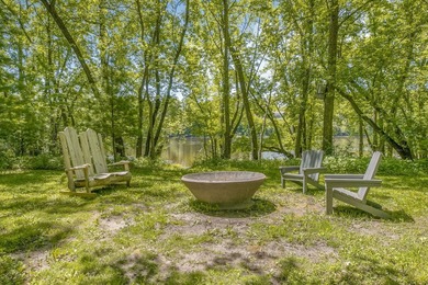 Tucked away on 1.78 private and wooded acres along the majestic - photo 43