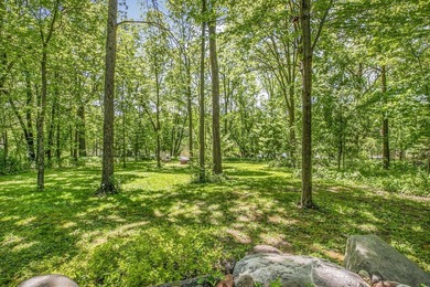 Tucked away on 1.78 private and wooded acres along the majestic - photo 45