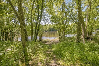 Tucked away on 1.78 private and wooded acres along the majestic - photo 46