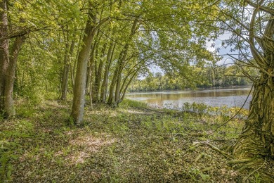 Tucked away on 1.78 private and wooded acres along the majestic - photo 47