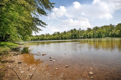 Tucked away on 1.78 private and wooded acres along the majestic - photo 49
