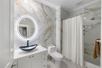 This completely renovated 3-bedroom, 3-bath, corner-unit - photo 21