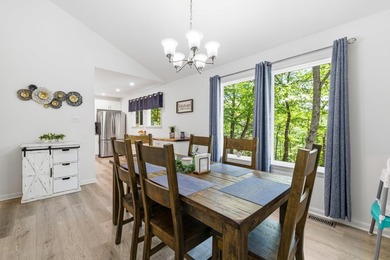Stunning renovated contemporary with a park like setting perched - photo 11