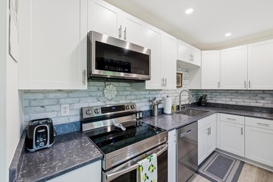 Stunning renovated contemporary with a park like setting perched - photo 14
