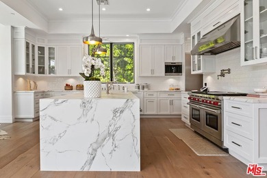 This meticulously crafted estate is located in the highly