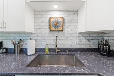 Stunning renovated contemporary with a park like setting perched - photo 18