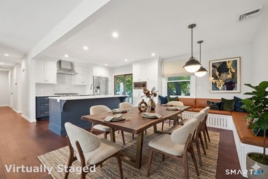 Welcome home to this charming and beautifully maintained - photo 3