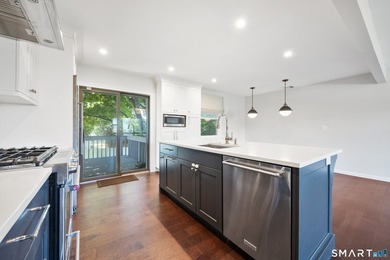 Welcome home to this charming and beautifully maintained - photo 5