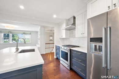 Welcome home to this charming and beautifully maintained - photo 6
