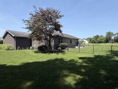 This 2016 ranch enjoys 300 feet of wooded creek frontage on just - photo 33