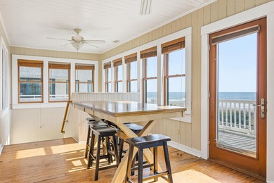 Welcome to this charming  oceanfront 7 bedroom, 7 bath beach