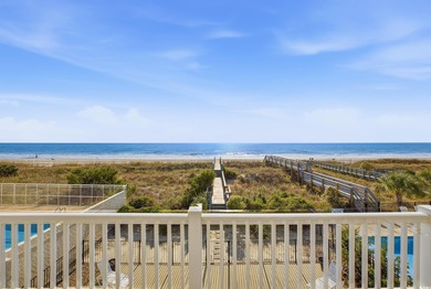 Welcome to this charming  oceanfront 7 bedroom, 7 bath beach