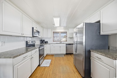 Welcome to this charming  oceanfront 7 bedroom, 7 bath beach