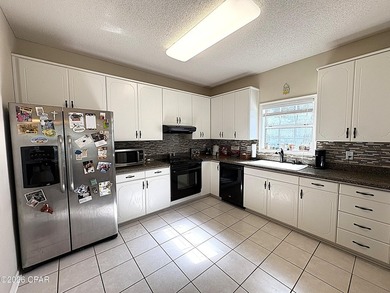 Located on the Magnolia Oaks Golf Course 12th hole and fairway - photo 22