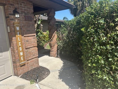 Nestled in a prime Melbourne location, this beautiful home sits - photo 2