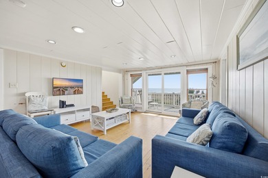 Welcome to this charming  oceanfront 7 bedroom, 7 bath beach