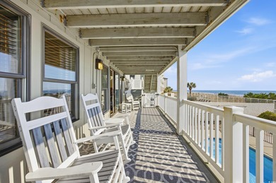 Welcome to this charming  oceanfront 7 bedroom, 7 bath beach