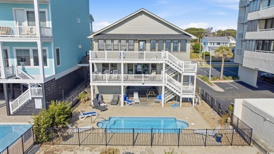 Welcome to this charming  oceanfront 7 bedroom, 7 bath beach