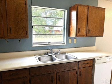 Welcome to this 4-bedroom, 1.5-bath home offering approximately - photo 8