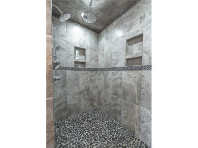 Tucked into a private setting in the heart of town, this - photo 35