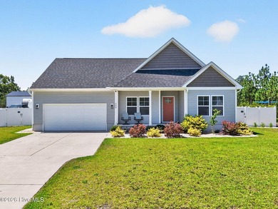 Built in 2023, this open-concept home offers 3 generously sized - photo 1