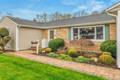 Welcome to this beautiful expanded ranch located in the - photo 2