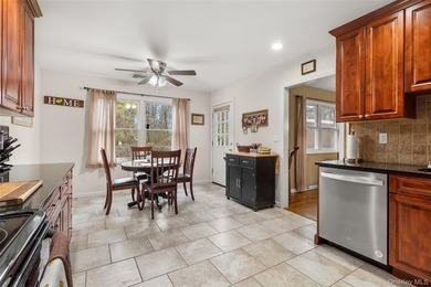 Welcome to this beautiful expanded ranch located in the - photo 7