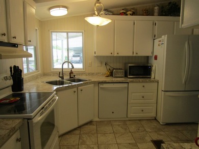 Listed by the Official Sales Team of Jamaica Bay Village. Move - photo 4