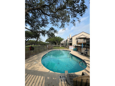 Highly sought after ground floor corner end unit overlooking the - photo 11
