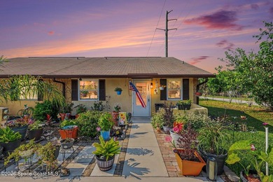 Welcome to Meadows South! This end-unit 2-bedroom, 2-bath - photo 1