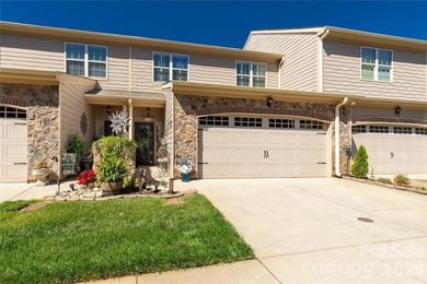 Welcome home to this beautifully maintained townhome in the - photo 1