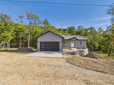 Lake of the Ozarks Home For Sale in Laurie Missouri