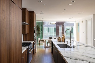 Welcome to an exceptional coastal residence in the coveted Lido