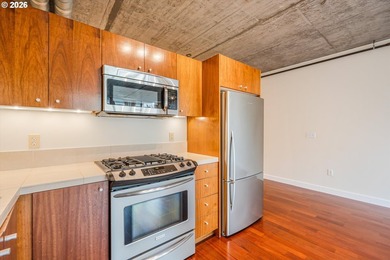 Modern 5th-floor loft condo next to Providence Park, home of the