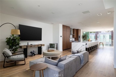 Welcome to an exceptional coastal residence in the coveted Lido