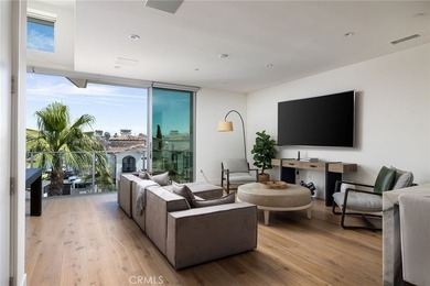 Welcome to an exceptional coastal residence in the coveted Lido