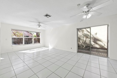 This light-filled home welcomes you into a spacious living room - photo 15