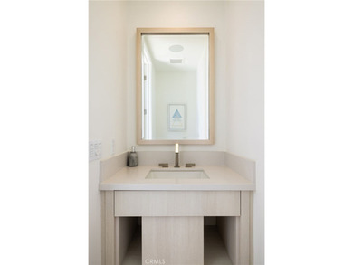 Welcome to an exceptional coastal residence in the coveted Lido