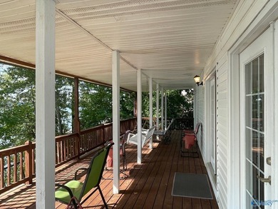 Multi- level home on Weiss Lake, located on Embos Island in - photo 17