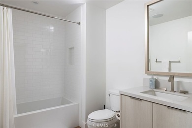 Welcome to an exceptional coastal residence in the coveted Lido