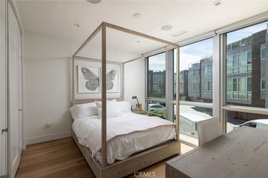 Welcome to an exceptional coastal residence in the coveted Lido