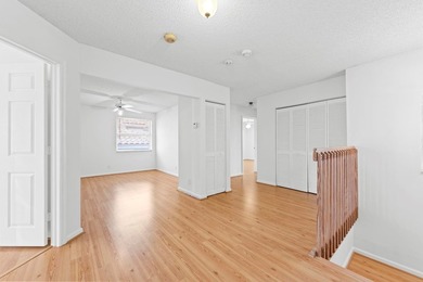 This light-filled home welcomes you into a spacious living room - photo 19