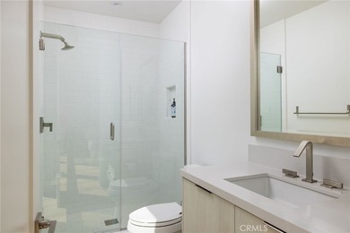 Welcome to an exceptional coastal residence in the coveted Lido